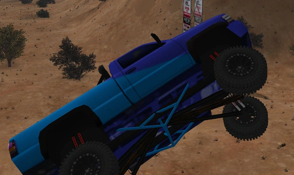 Blauer Offroader kopfüber in Wüstenlandschaft – aus dem Mod 4x4 Evo 2 EvoR Edition