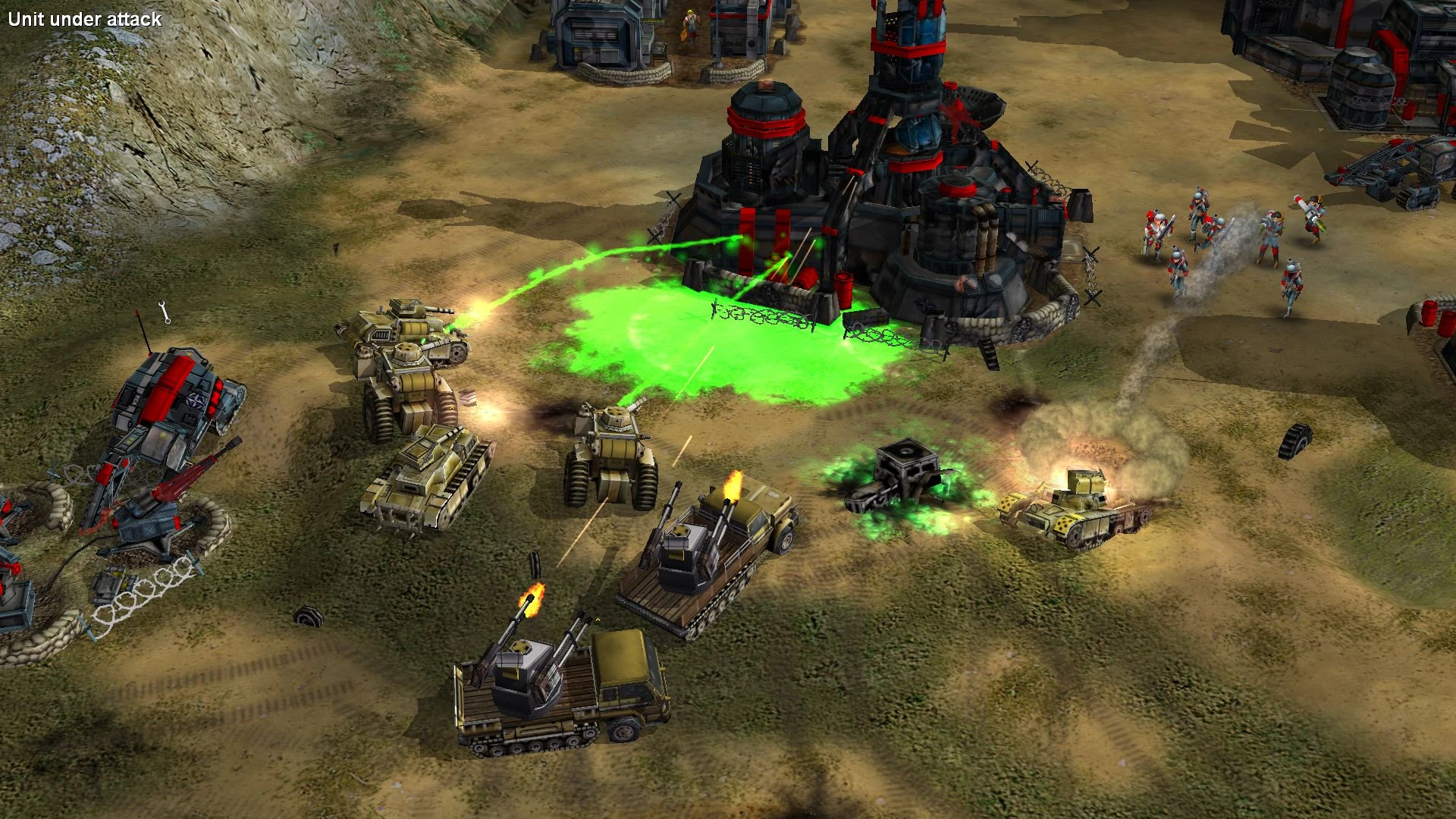 Tanks and infantry attacking a base with green toxic spill and smoke in Command & Conquer: Generals mod