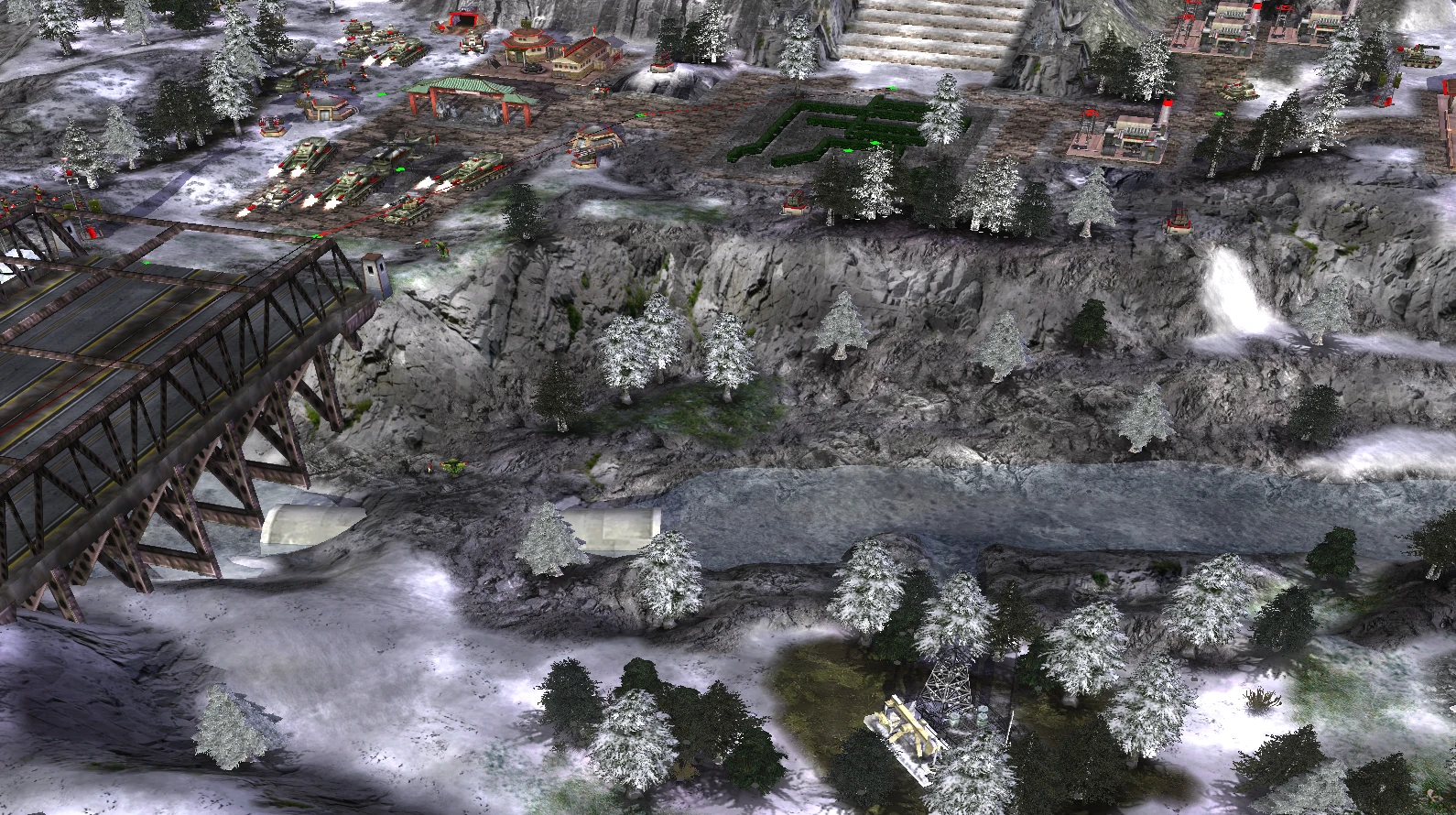 Вид на сніжне поле бою Command & Conquer Generals з танками, будівлями, мостом і водою