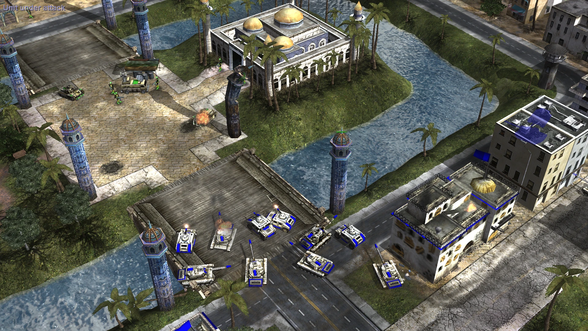 Скріншот показує танки та піхоту біля будівель і річки в моді C&C Generals версії 2.0