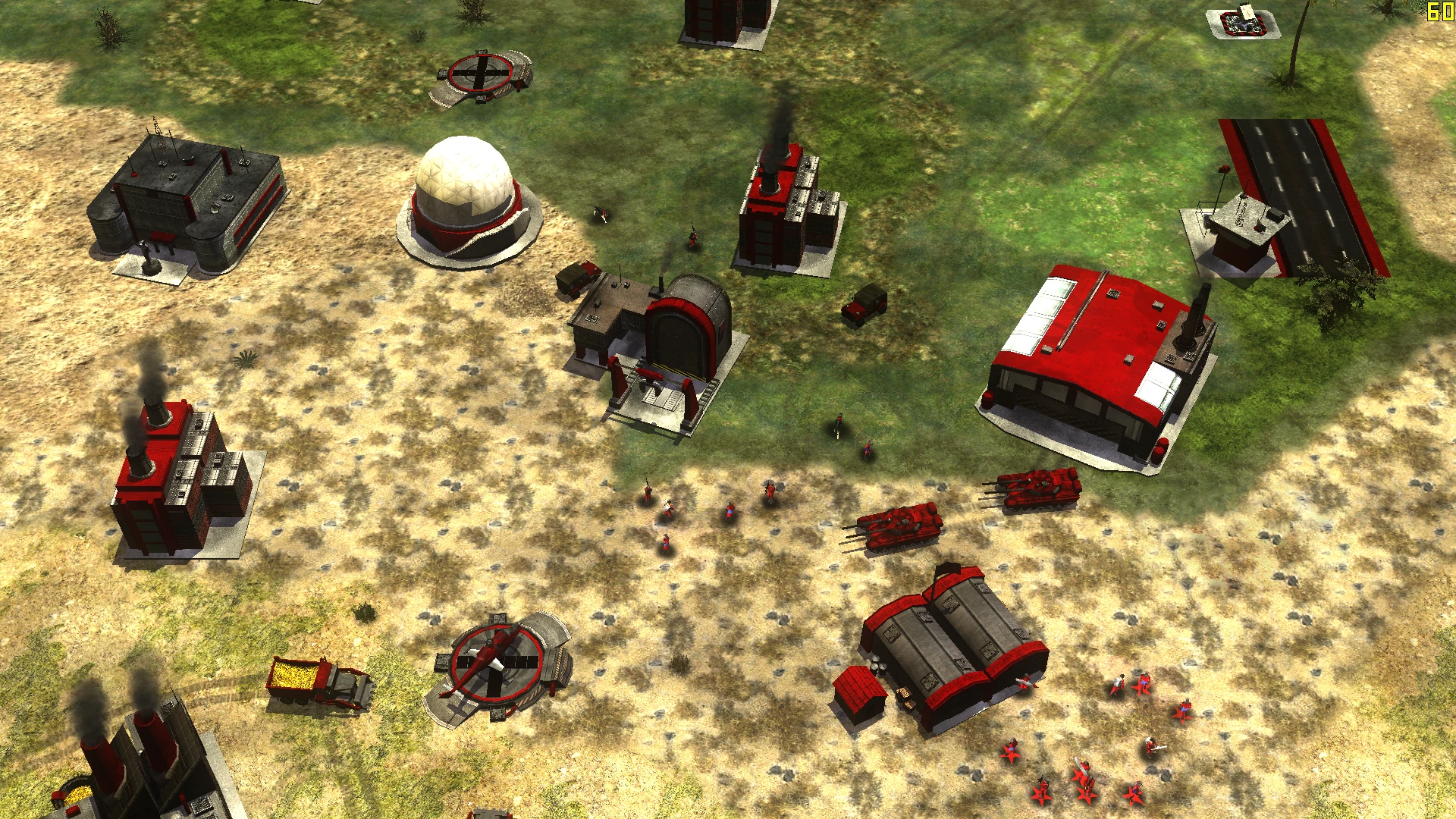 Overhead view showing red-themed base buildings, tanks, infantry soldiers, and a helicopter in Command & Conquer Generals mod