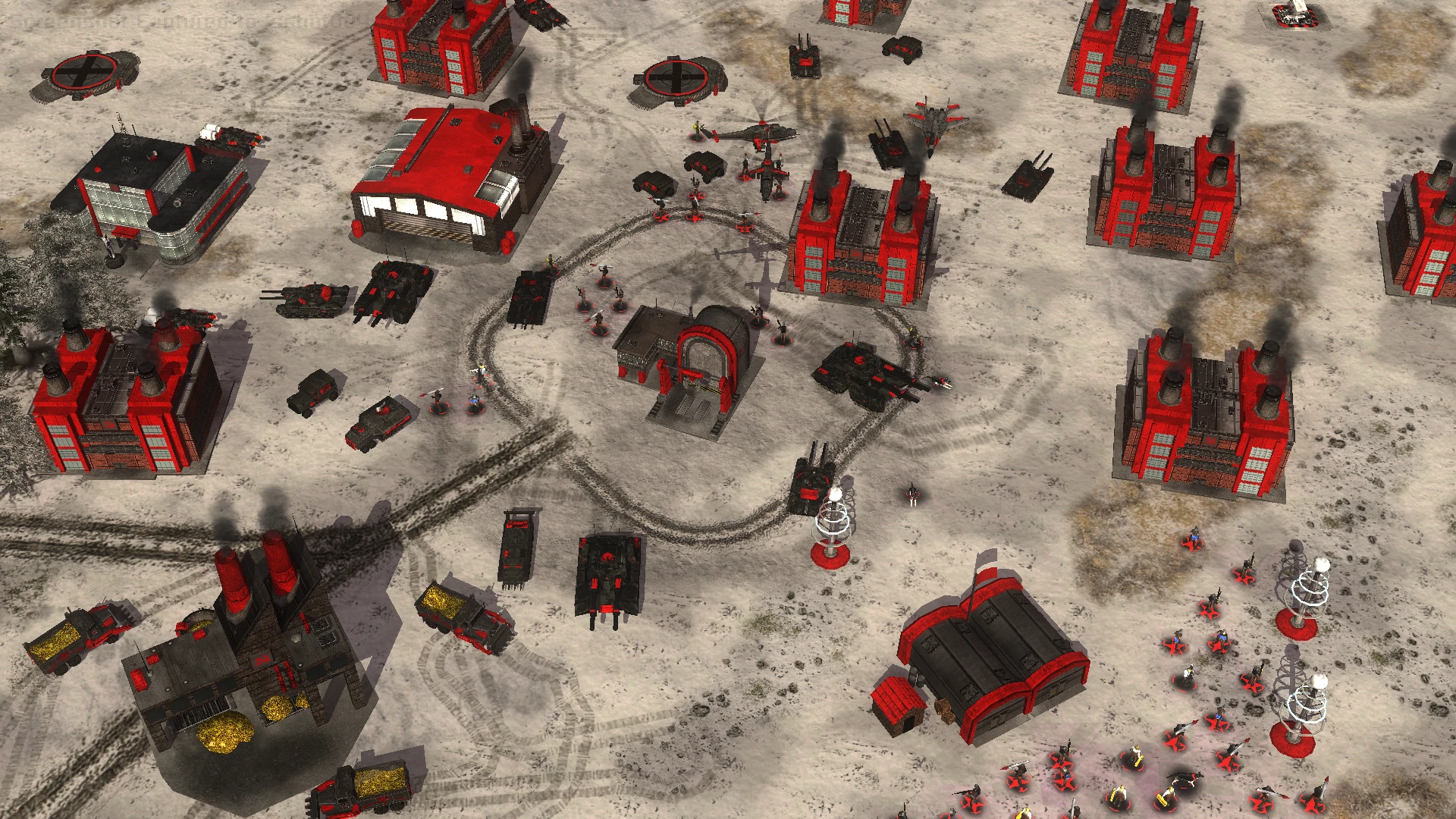Top-down view of a snowy Red Alert Redux base with red-black buildings, tanks, planes, infantry, and power structures