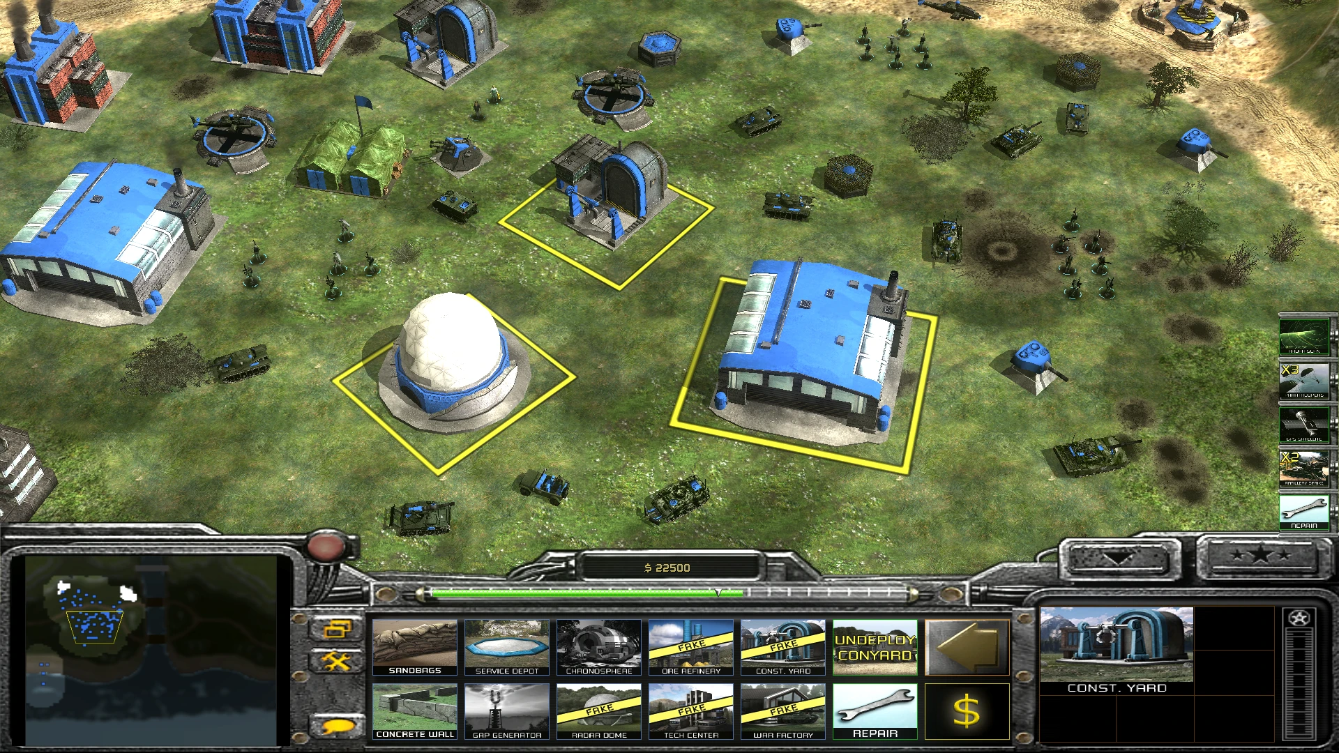 Game screenshot showing a blue base with buildings, vehicles, infantry units, and a user interface with construction options