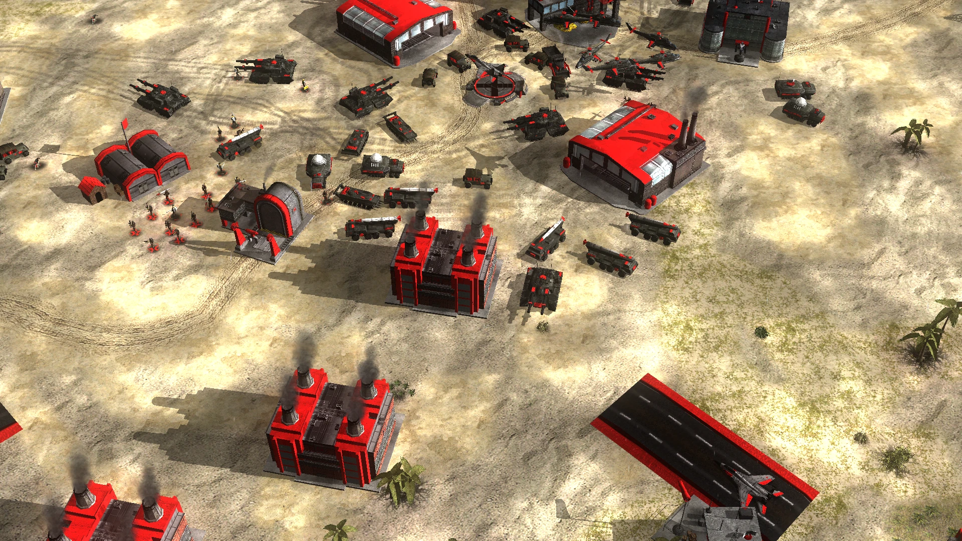 A desert base with red and black military buildings, vehicles, tanks, and infantry in a Command & Conquer Generals mod