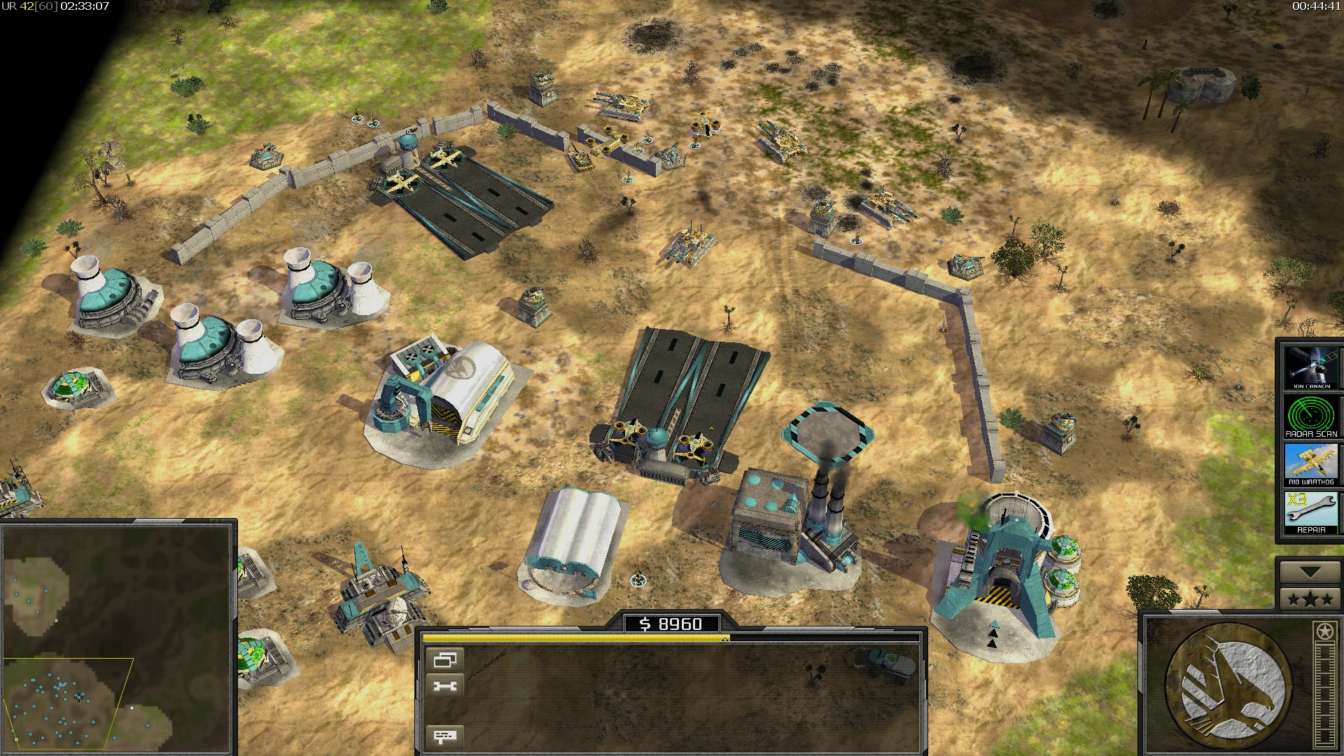 Aerial view of Command & Conquer Generals base with defensive walls, turrets, buildings, and units visible in mod