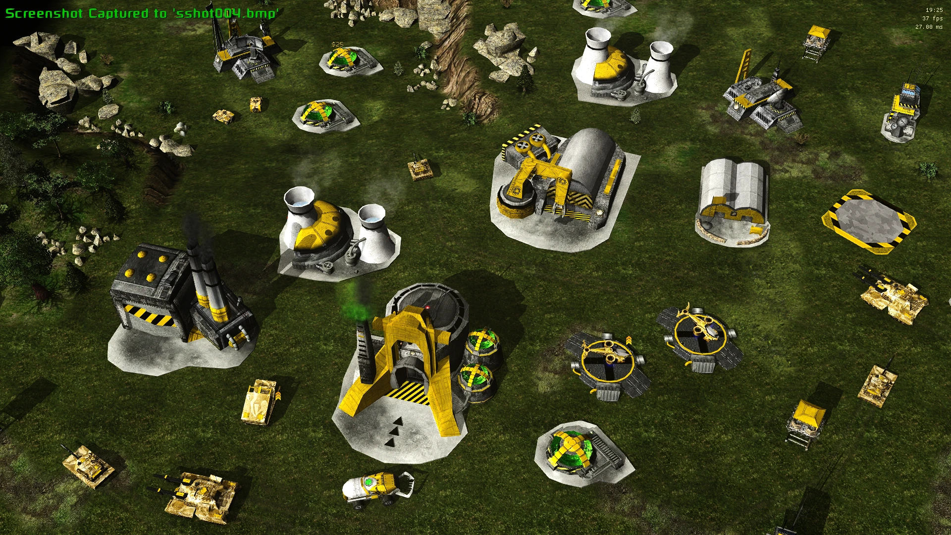 Top view of a base with yellow and white factories, tanks, and artillery units from C&C Tiberian Dawn Redux mod