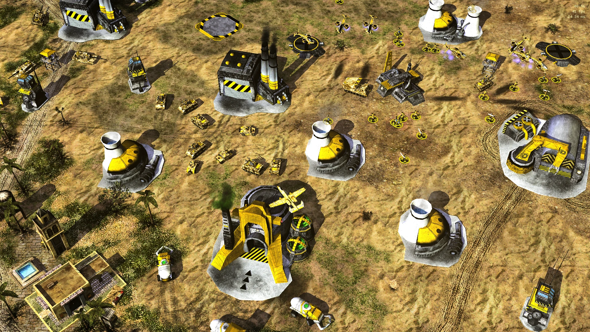 Top-down view of futuristic yellow and gray military base with tanks, helicopters and infantry in C&C Tiberian Dawn Redux mod