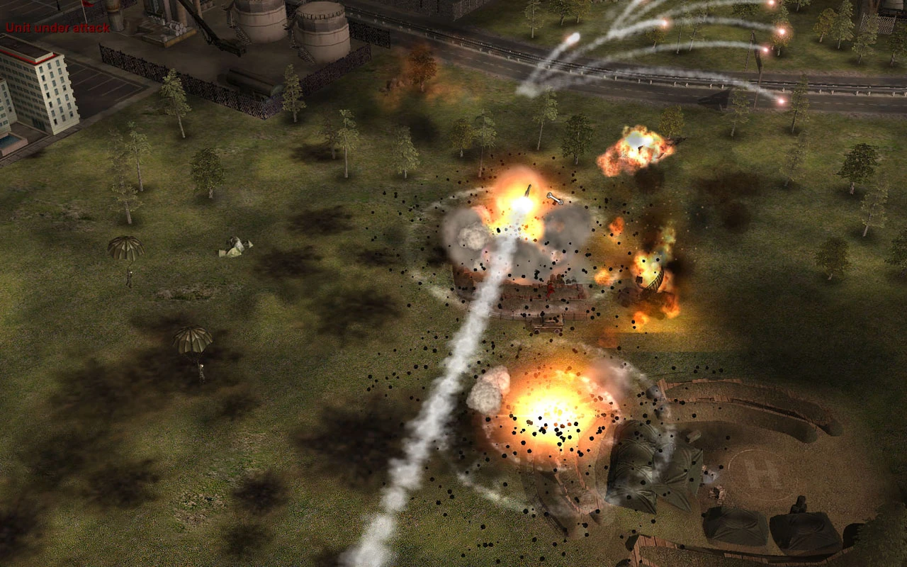 In-Game-Szene des Cold War Crisis Mods für Command & Conquer Generals mit mehreren Explosionen und Raketenstreifen