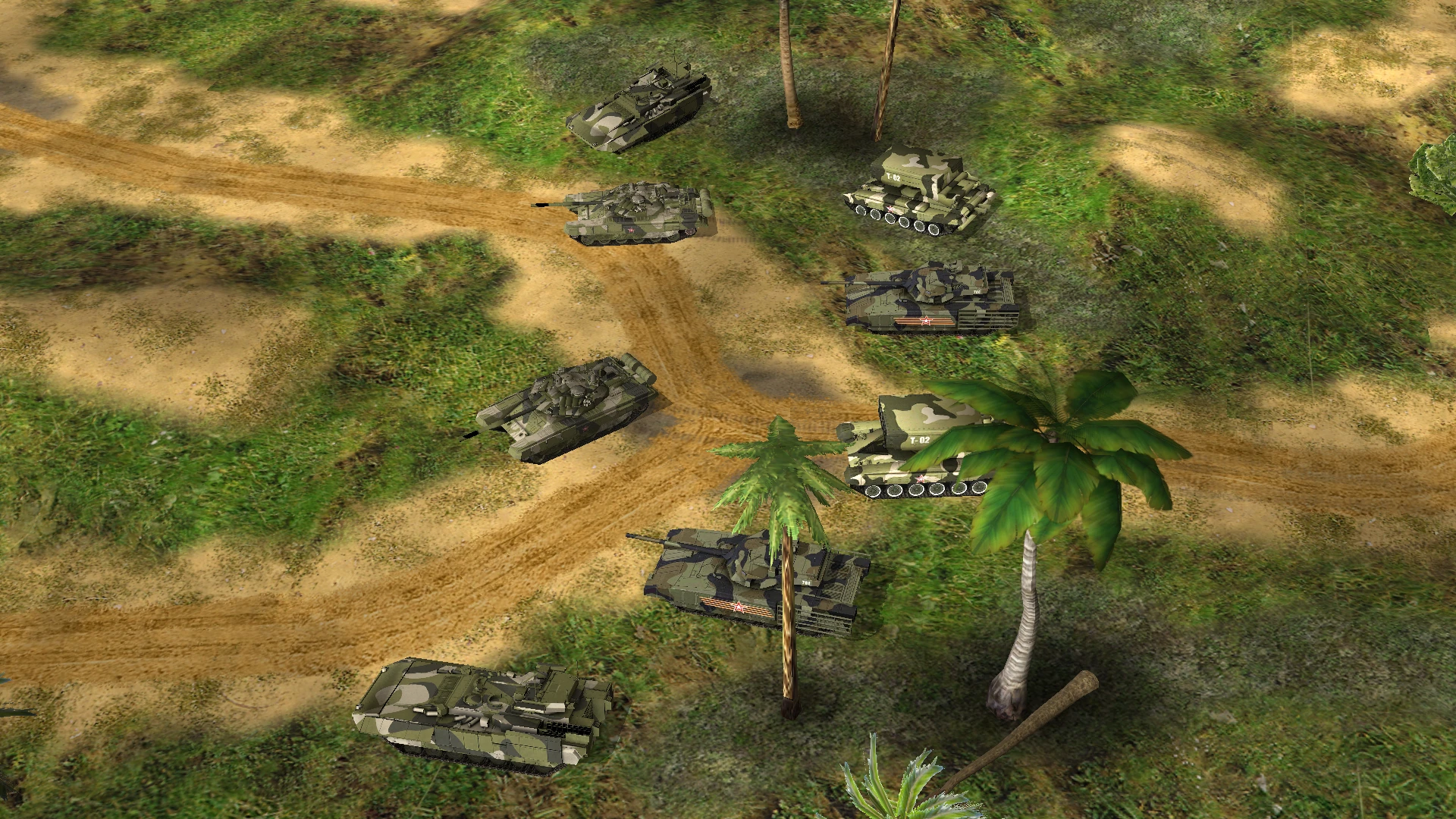 Draufsicht auf mehrere grün getarnte Panzer auf Erdwegen und Gras mit Palmen