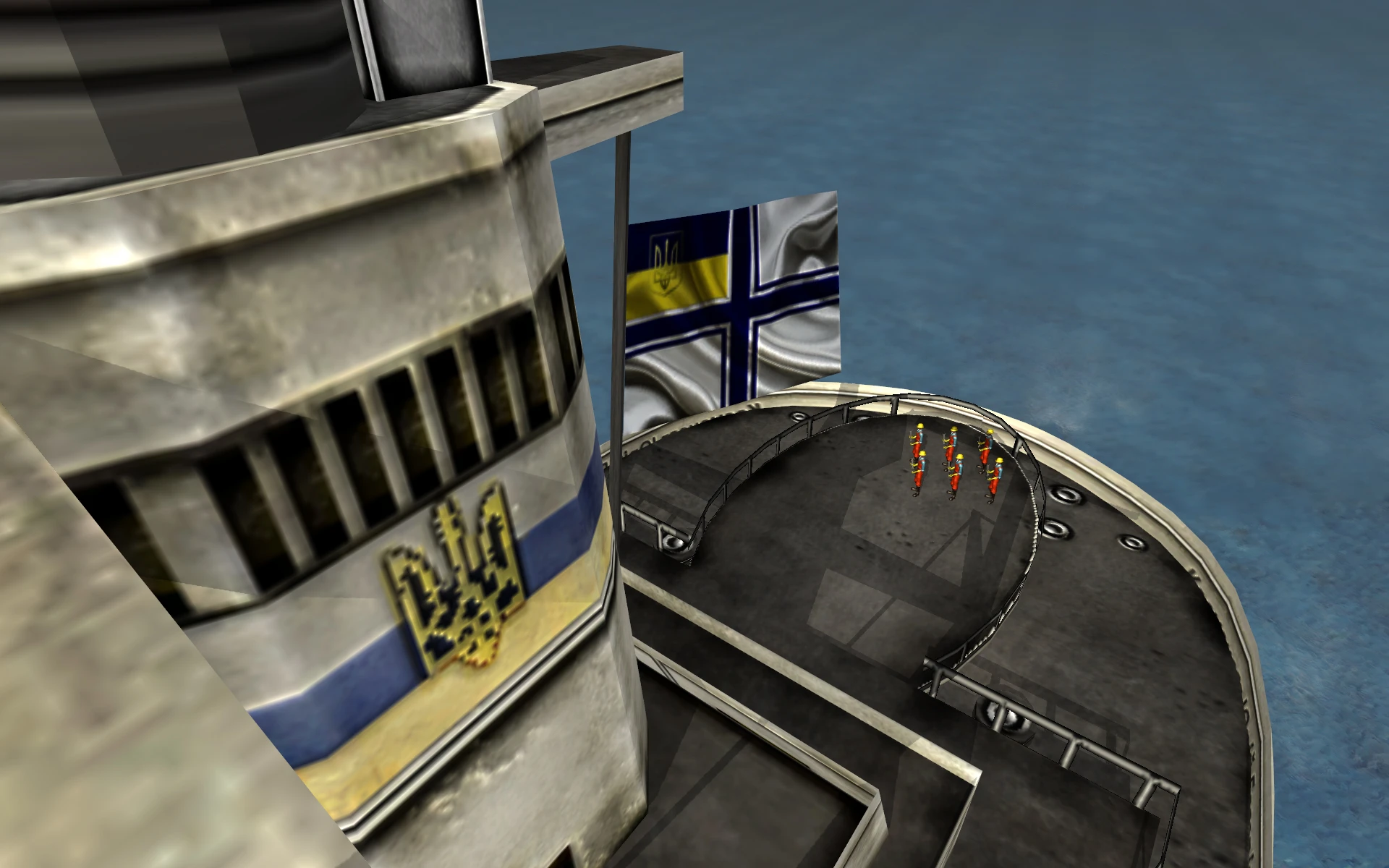 Draufsicht auf das Deck eines Kriegsschiffs mit sechs Soldaten in orangefarbenen Uniformen und wehender ukrainischer Flagge