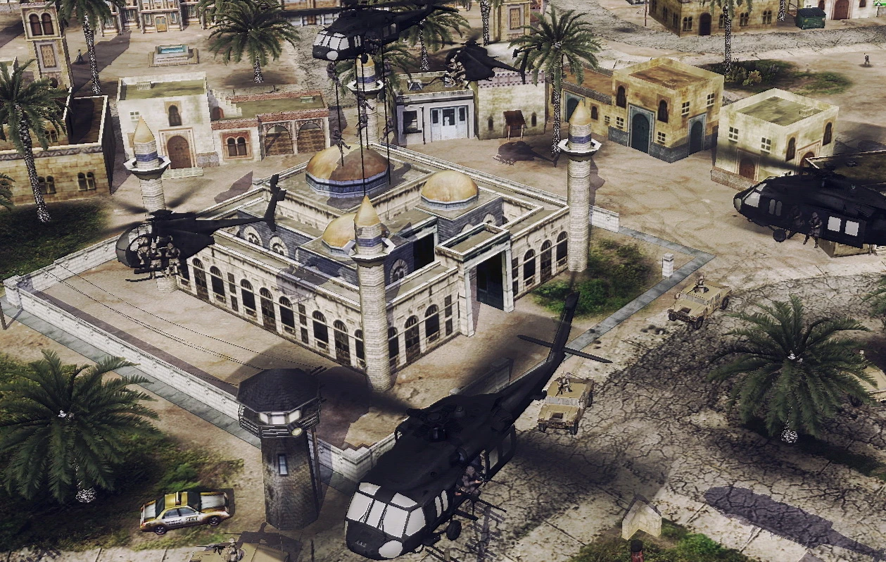 Hubschrauber und Militärfahrzeuge um ein Gebäude im Nahost-Stil in einer Wüstenstadt