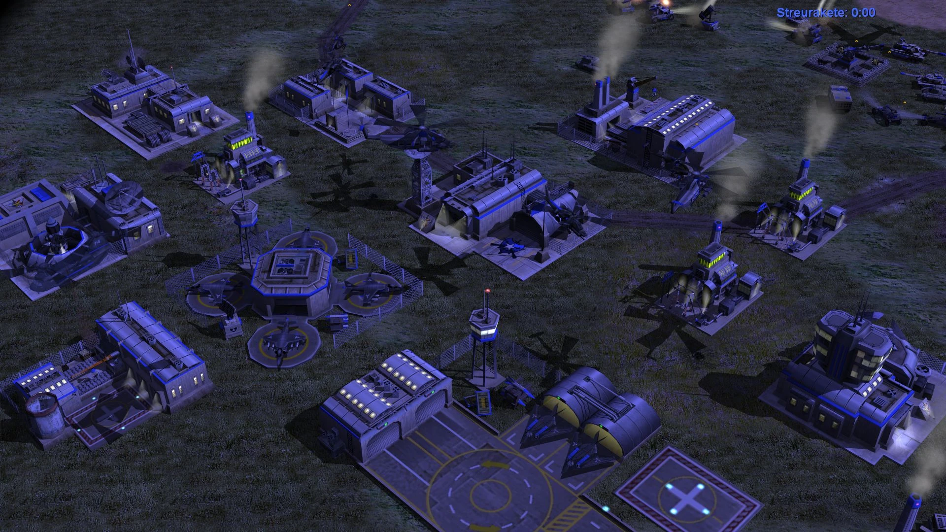 Widok z góry na nocną bazę z budynkami i wieloma helikopterami gotowymi do akcji w modzie Operation Firestorm