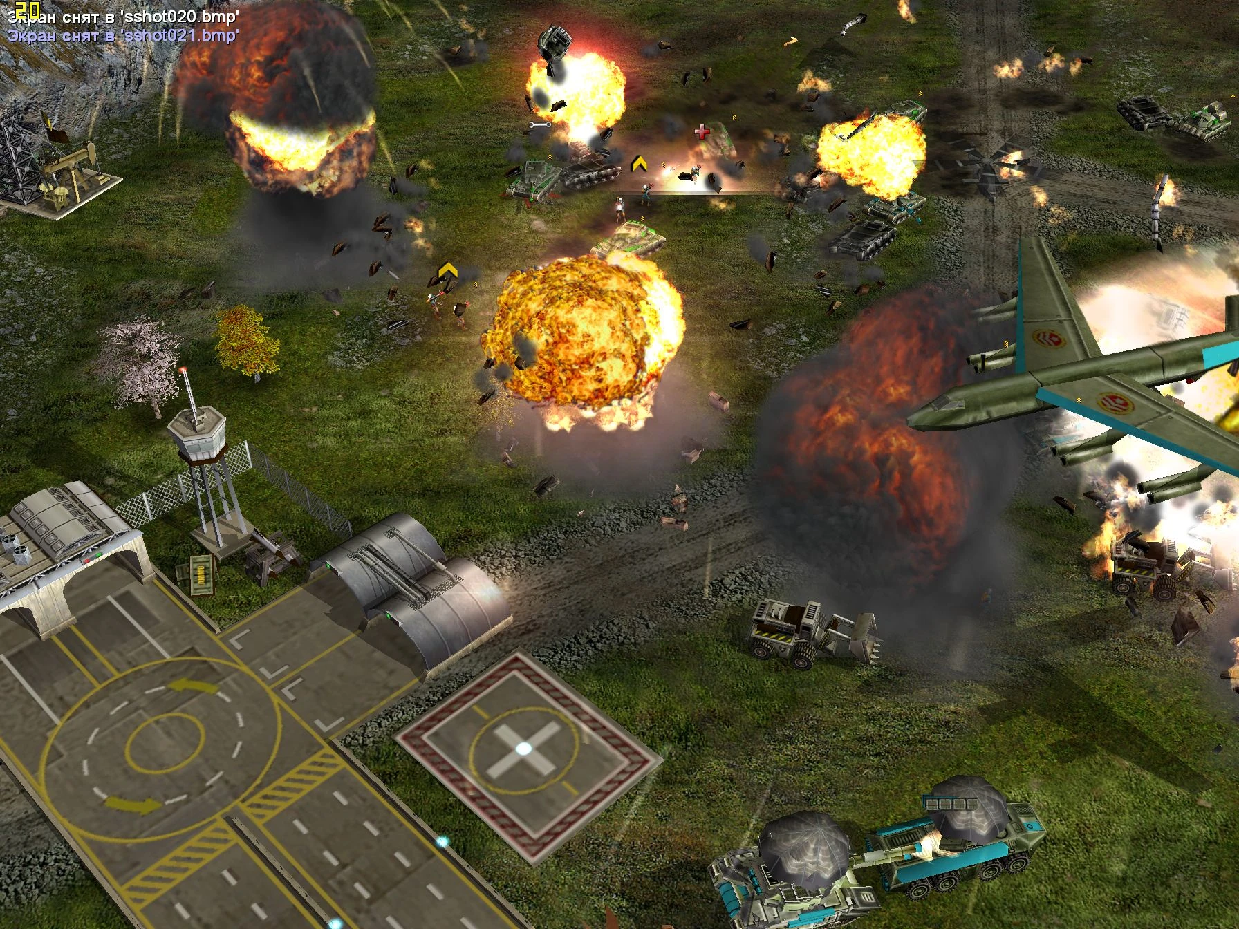 Explosions and military aircraft attacking tanks and infantry near a military base in Command & Conquer Generals mod