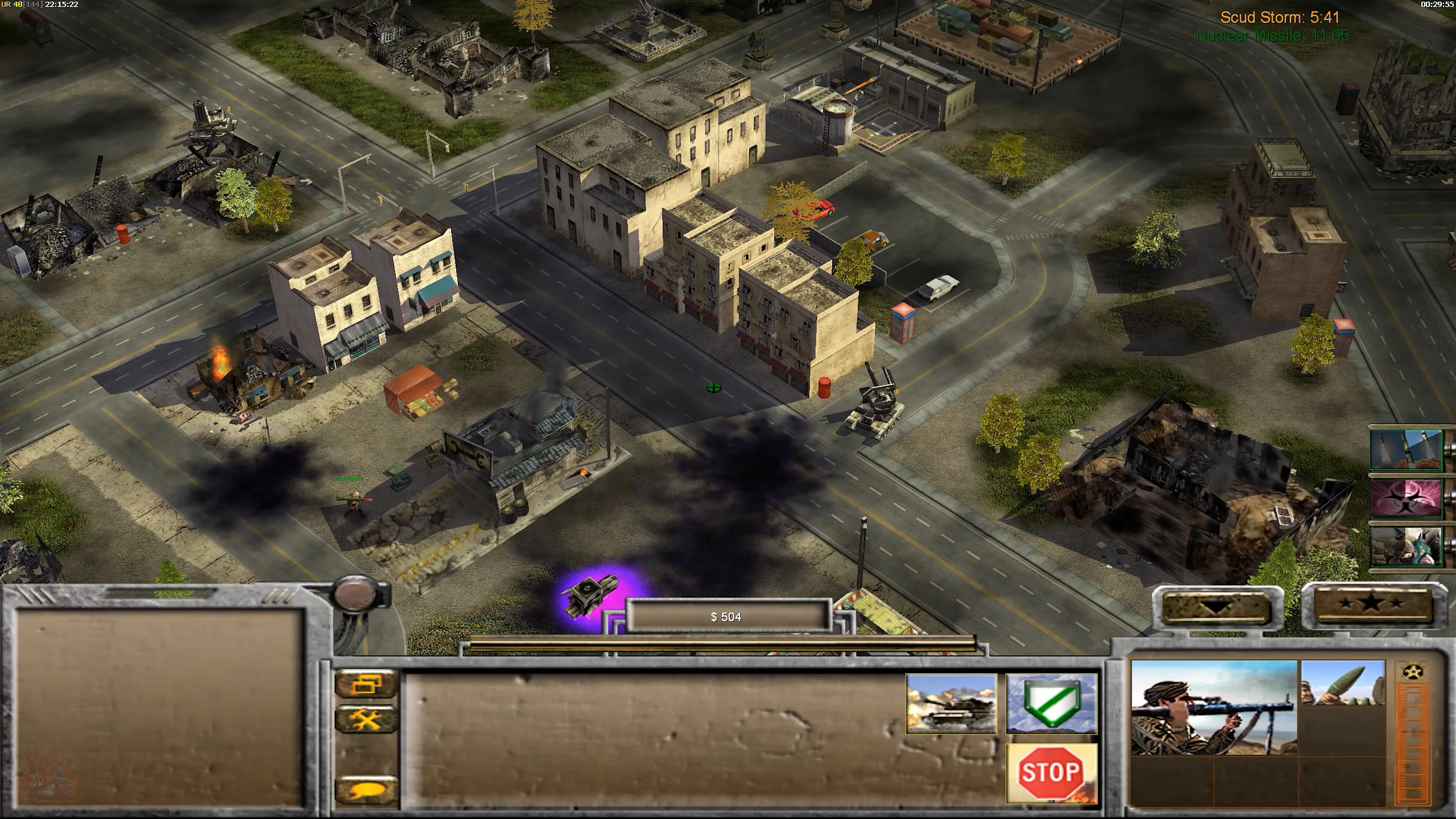 Screenshot from Command & Conquer Generals showing urban buildings, a burning structure, and user interface with The Power Of The West mod active