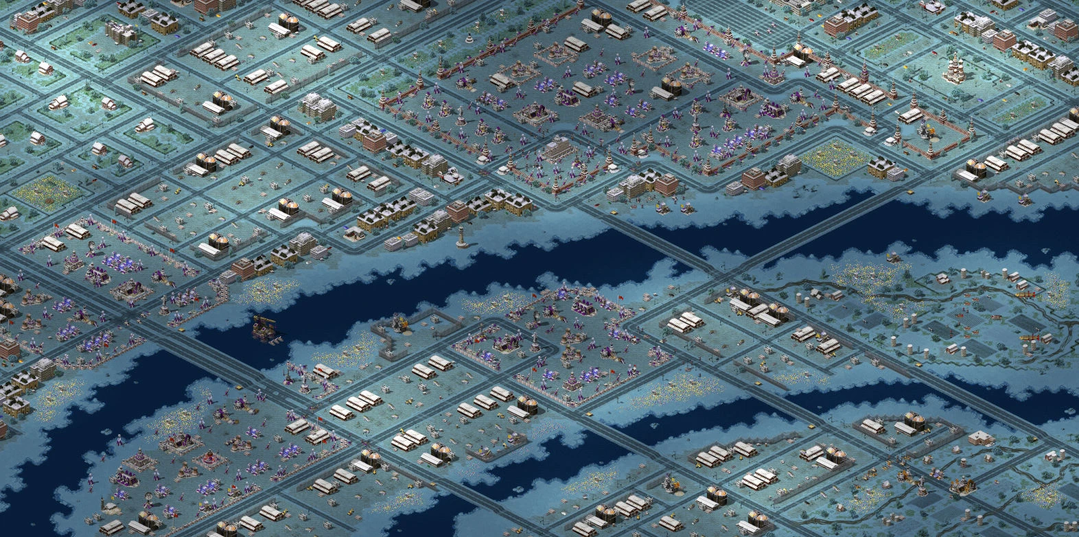 Draufsicht auf ein verschneites städtisches Schlachtfeld mit Einheiten und Gebäuden im Command & Conquer Red Alert 2 Mod