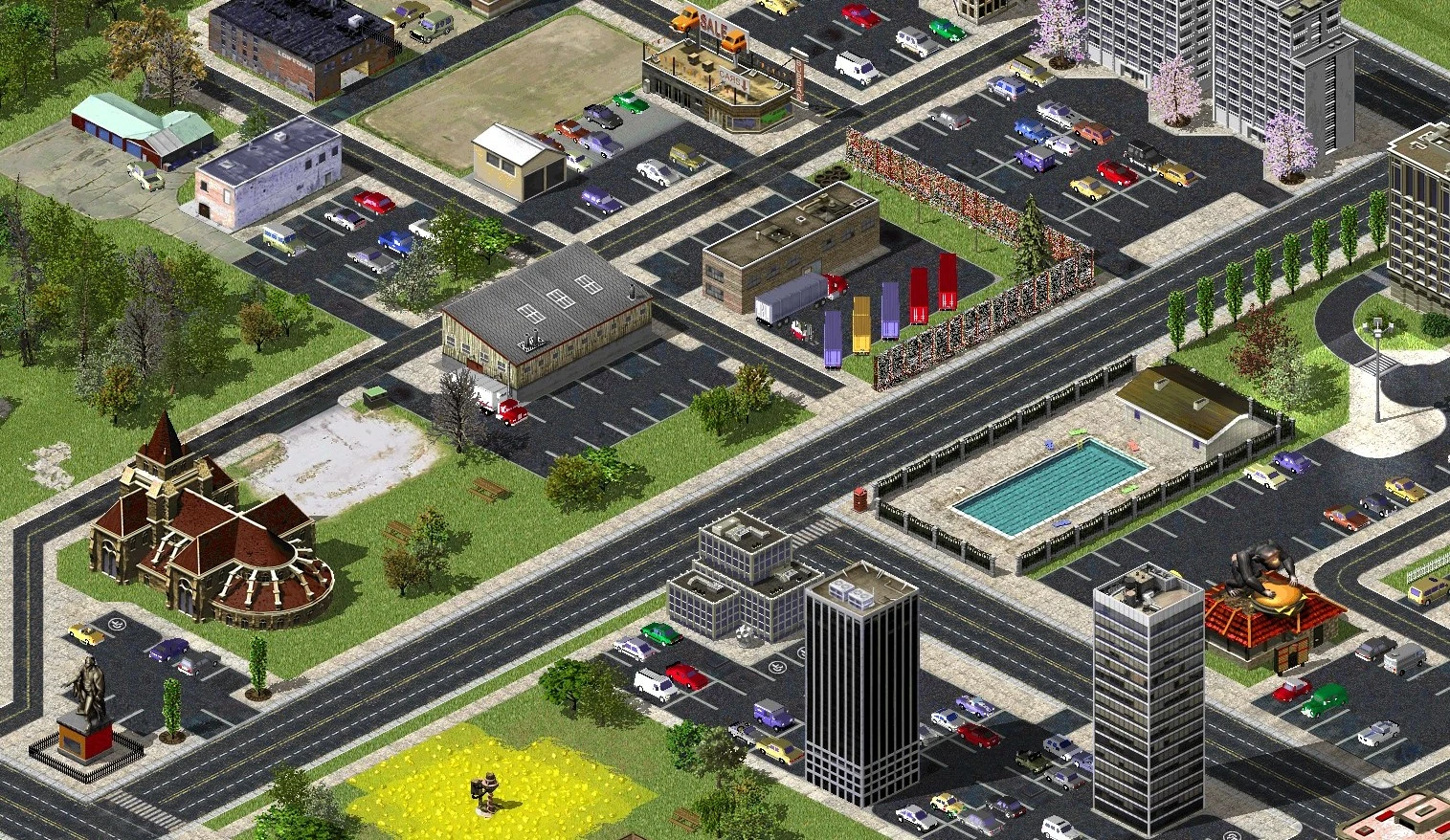Vista isométrica de un paisaje urbano con carreteras, estacionamientos, diversos edificios y una piscina cercada en el mod Scorched Earth