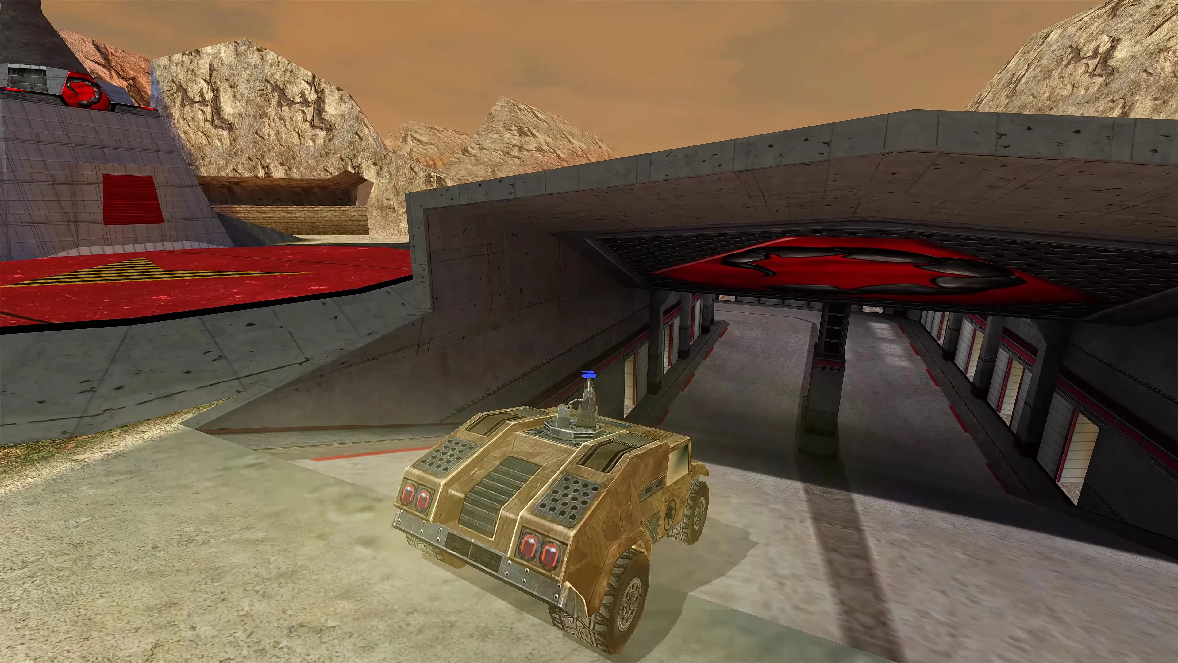 Броньований транспорт біля входу до бетонної бази з червоно-чорним символом Nod на стелі в моді RenHD