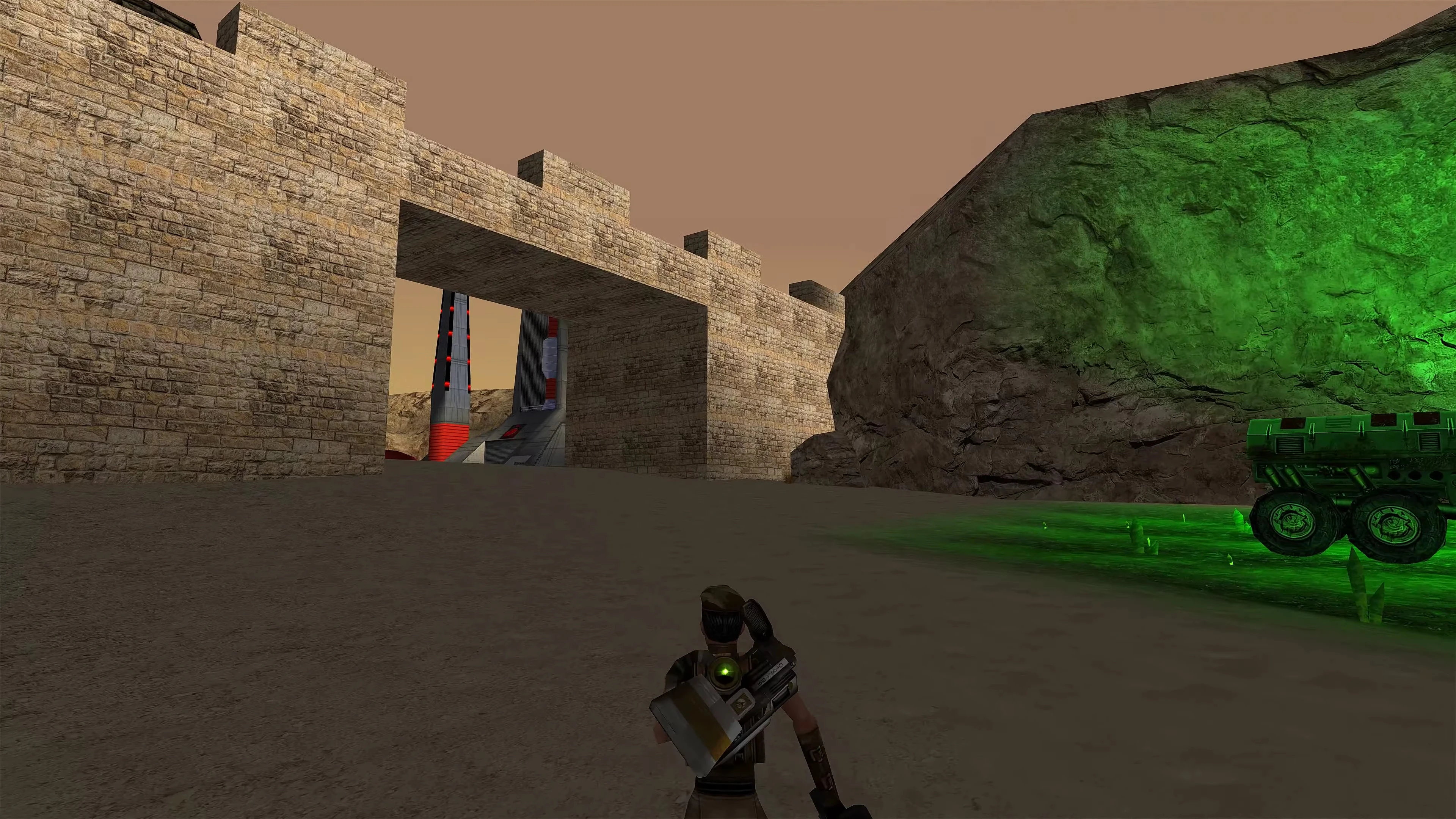 Вид від третьої особи на солдата біля кам'яної фортеці та світиться зеленим транспортом у моді RenHD для Command & Conquer Renegade