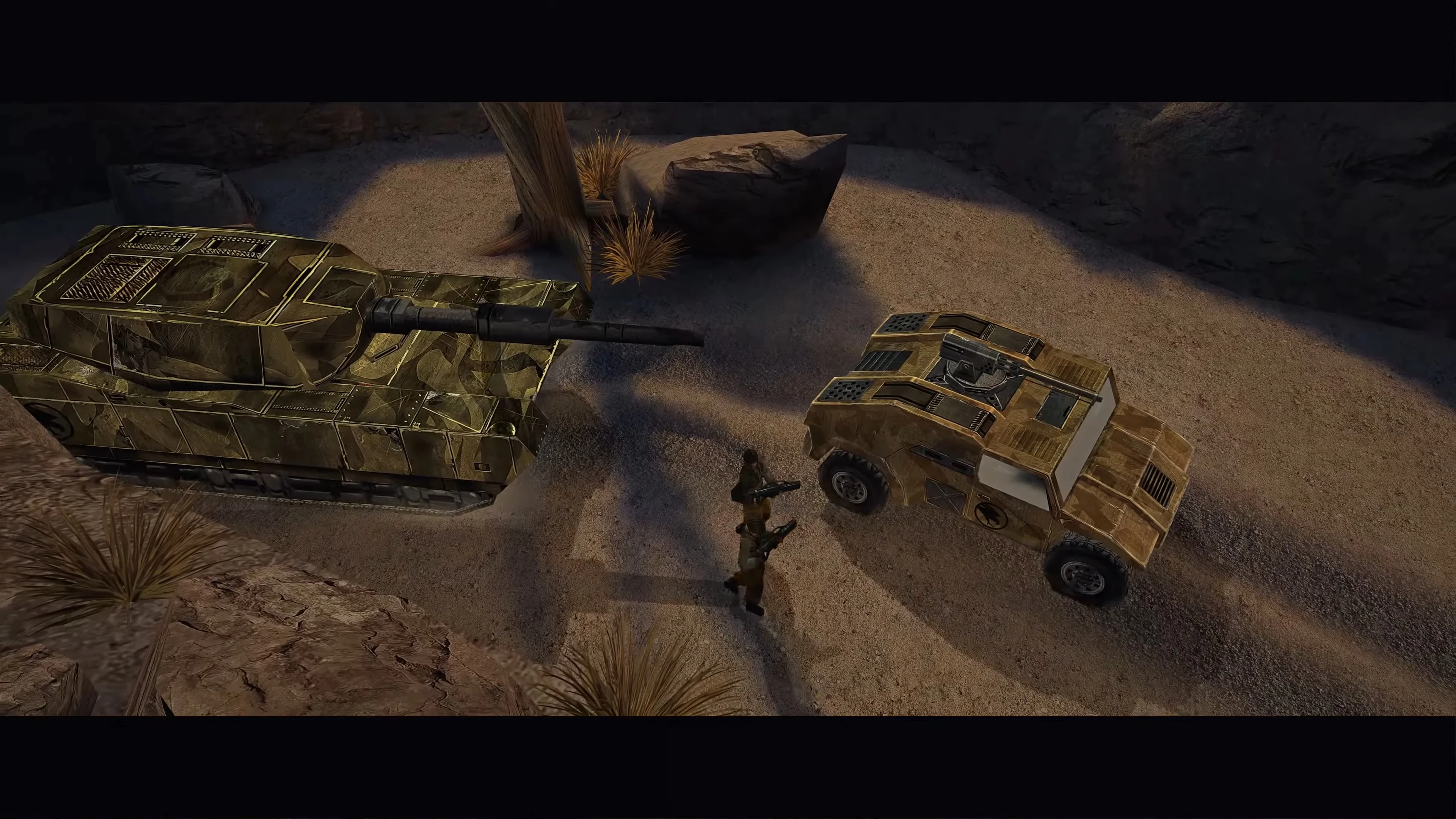 Вигляд зверху на замасковані танк і броньовану машину, що стоять один навпроти одного з двома солдатами на піщаній пустелі