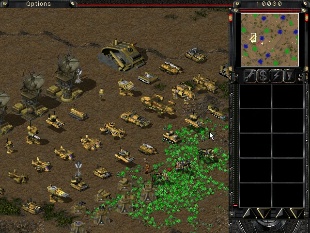 Captura de pantalla del mod C&C Tiberian Sun Synthesis con numerosos vehículos y estructuras amarillos en terreno árido