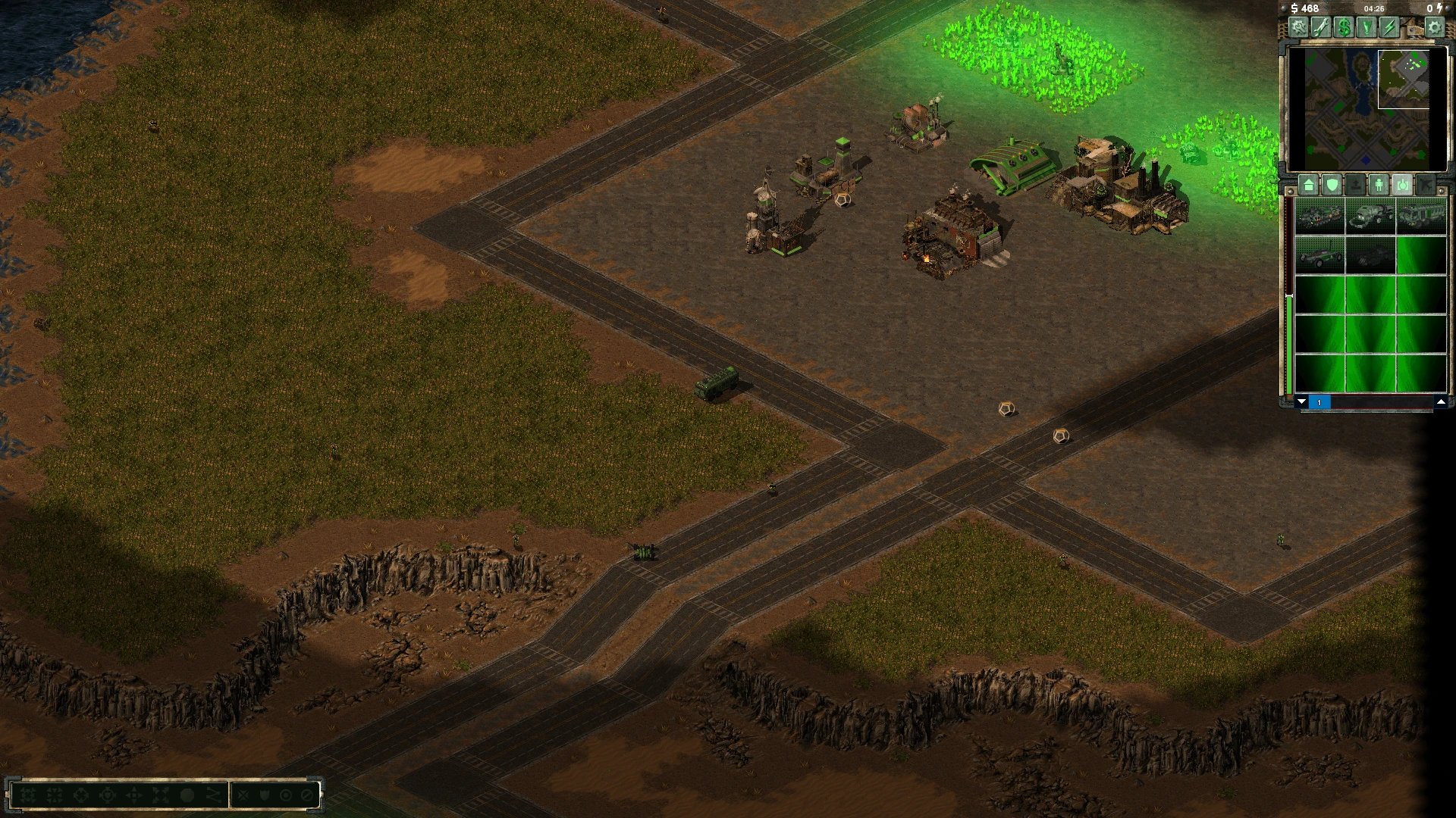 Isometrische Ansicht einer Tiberian Sun Basis mit Gebäuden und Fahrzeugen nahe grüner Tiberiumfelder im Crystallized Doom Mod