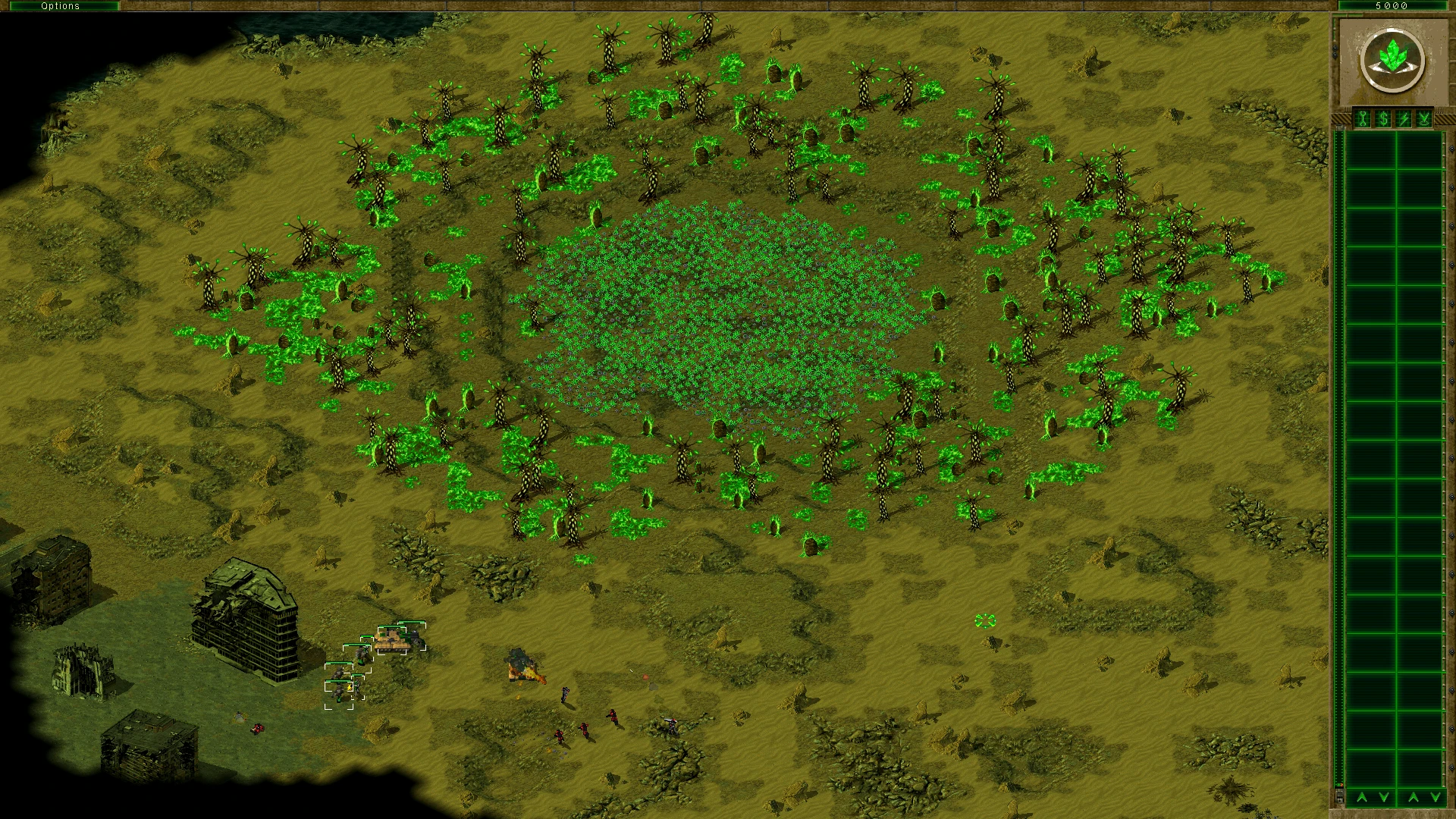 Скріншот мода Fading Dusk для Command & Conquer Tiberian Sun із зеленими кластерами Тіберіума та юнітами на піщаній пустці