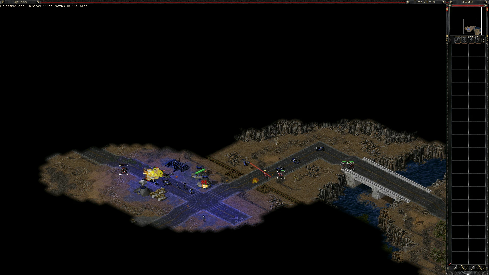 Геймплей Command & Conquer Tiberian Sun з атаками юнітів на пустельній дорозі біля мосту