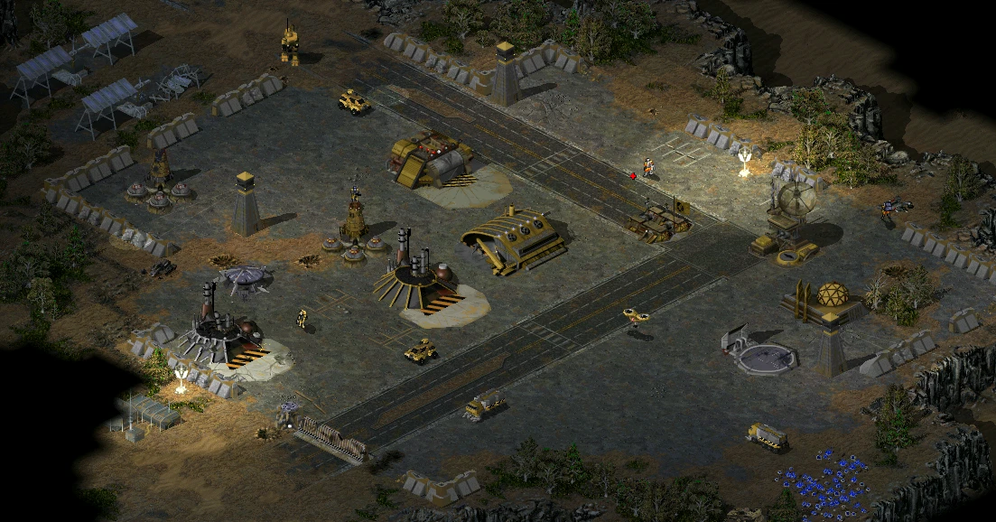 Isometrische Ansicht einer Militärbasis mit Verteidigungsanlagen und Einheiten im Command & Conquer Tiberian Sun Mod