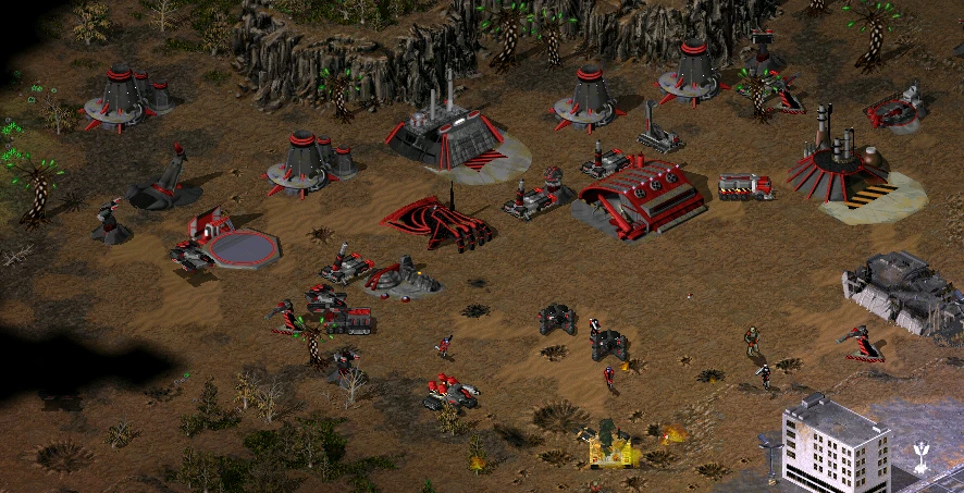 Draufsicht auf rote Fraktionsbasis mit Gebäuden, Fahrzeugen und Infanterie aus The Second Tiberium War Mod