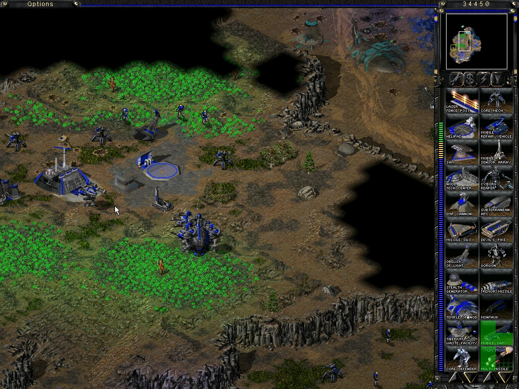 Screenshot von Command & Conquer Tiberian Sun mit Basisstrukturen und Infanterieeinheiten der Nod-Fraktion