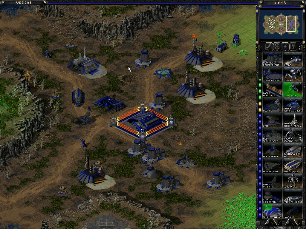Draufsicht auf eine Nod-Basis mit mehreren Gebäuden und Einheiten im Command & Conquer Tiberian Sun Mod