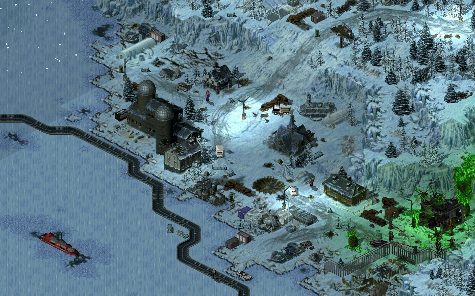 Вид сверху на заснеженное поле боя Command & Conquer Tiberian Sun с постройками, техникой и зелёной светящейся зоной