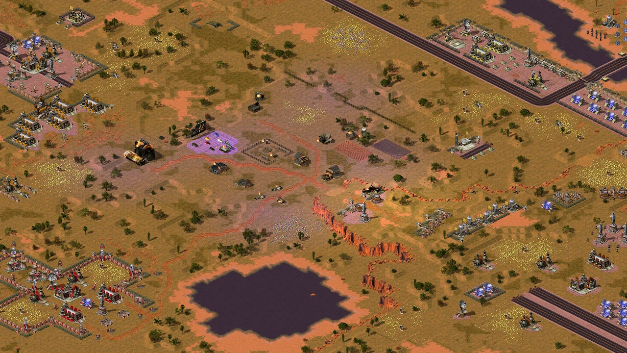 Luftansicht eines Wüsten-Schlachtfelds mit mehreren Basen, Einheiten, Mauern und Ressourcen im Alliance Reforged Mod