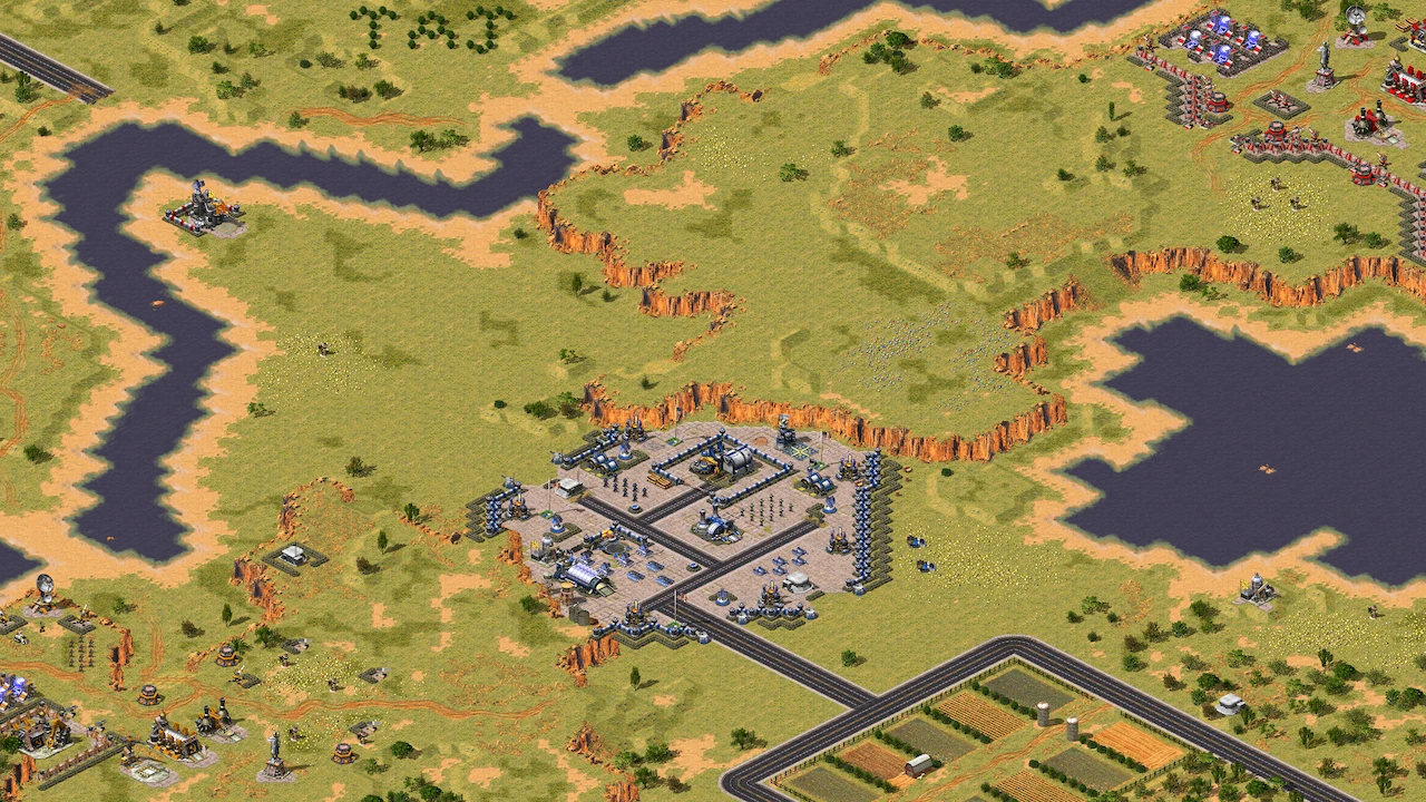 Draufsicht auf eine befestigte Basis mit Verteidigungsmauern, Türmen und Straßen im Alliance Reforged-Mod für Command & Conquer: Yuri's Revenge