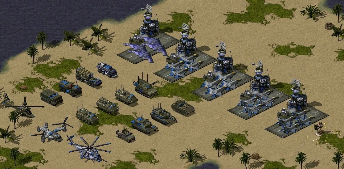 Una base desértica en Command & Conquer: Yuri's Revenge con varios helicópteros, tanques y aviones listos para la batalla en el mod Elaina