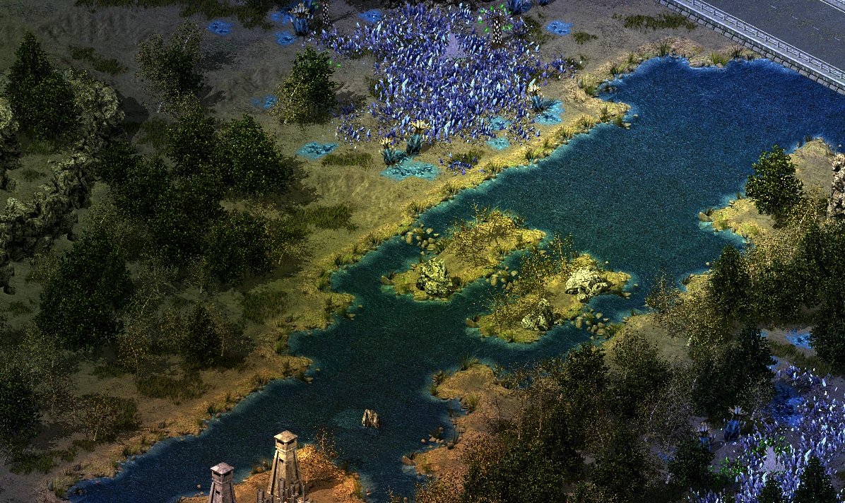 Vista aérea de un río que fluye a través de un área boscosa con rocas y plantas en el mod Global Crisis de Command & Conquer Yuri's Revenge
