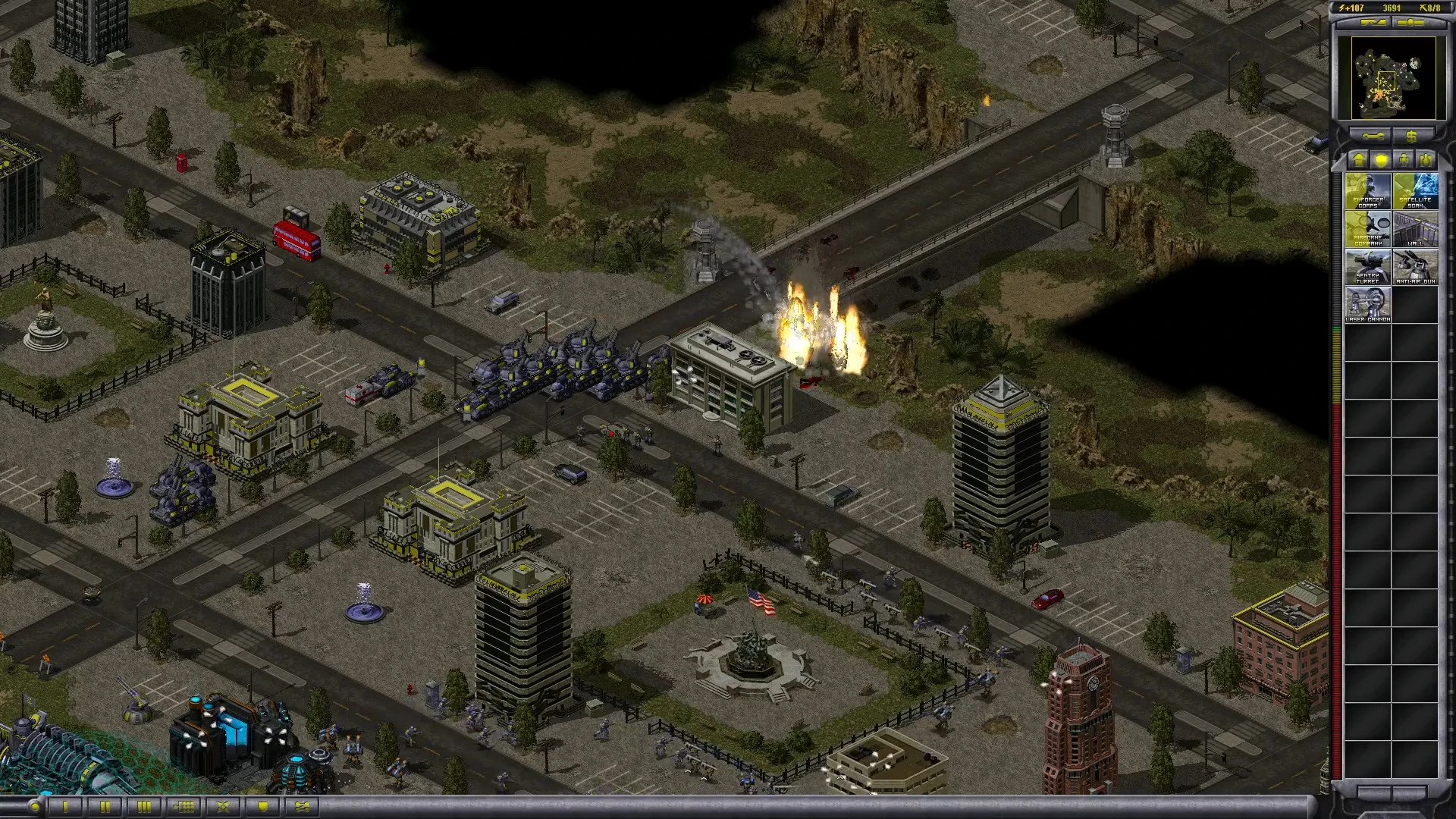 Screenshot of urban combat with explosions, tanks and soldiers in Project Phantom mod for Command & Conquer Yuri's Revenge
