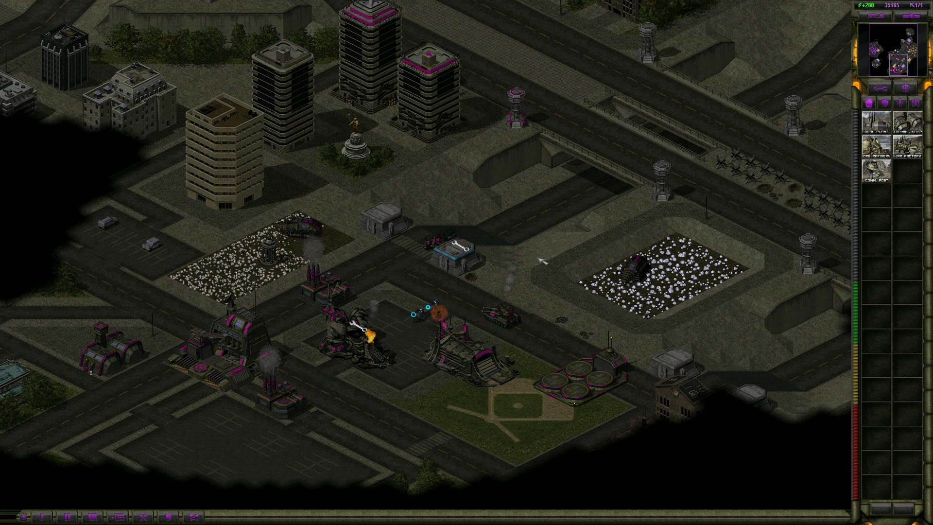Command & Conquer Yuri's Revenge screenshot showing urban defense base with various military buildings and units in Project Phantom mod