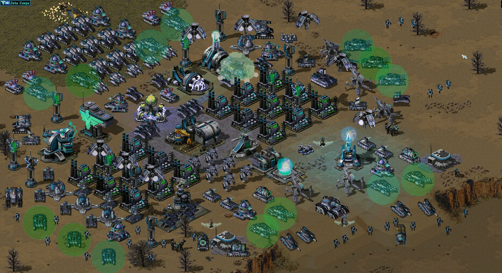 Widok z góry na dużą futurystyczną bazę z wieloma budynkami, czołgami i jednostkami piechoty w modzie Yuri's Revenge Reboot