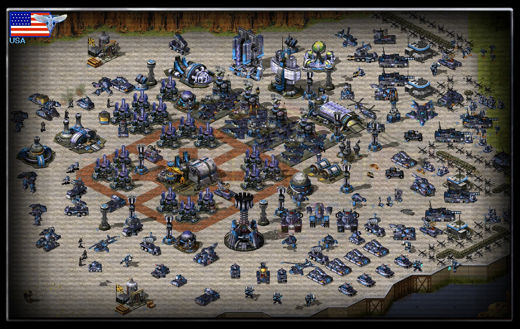 Duża baza frakcji USA z licznymi czołgami, piechotą i budynkami w modzie Reboot do Command & Conquer Yuri's Revenge