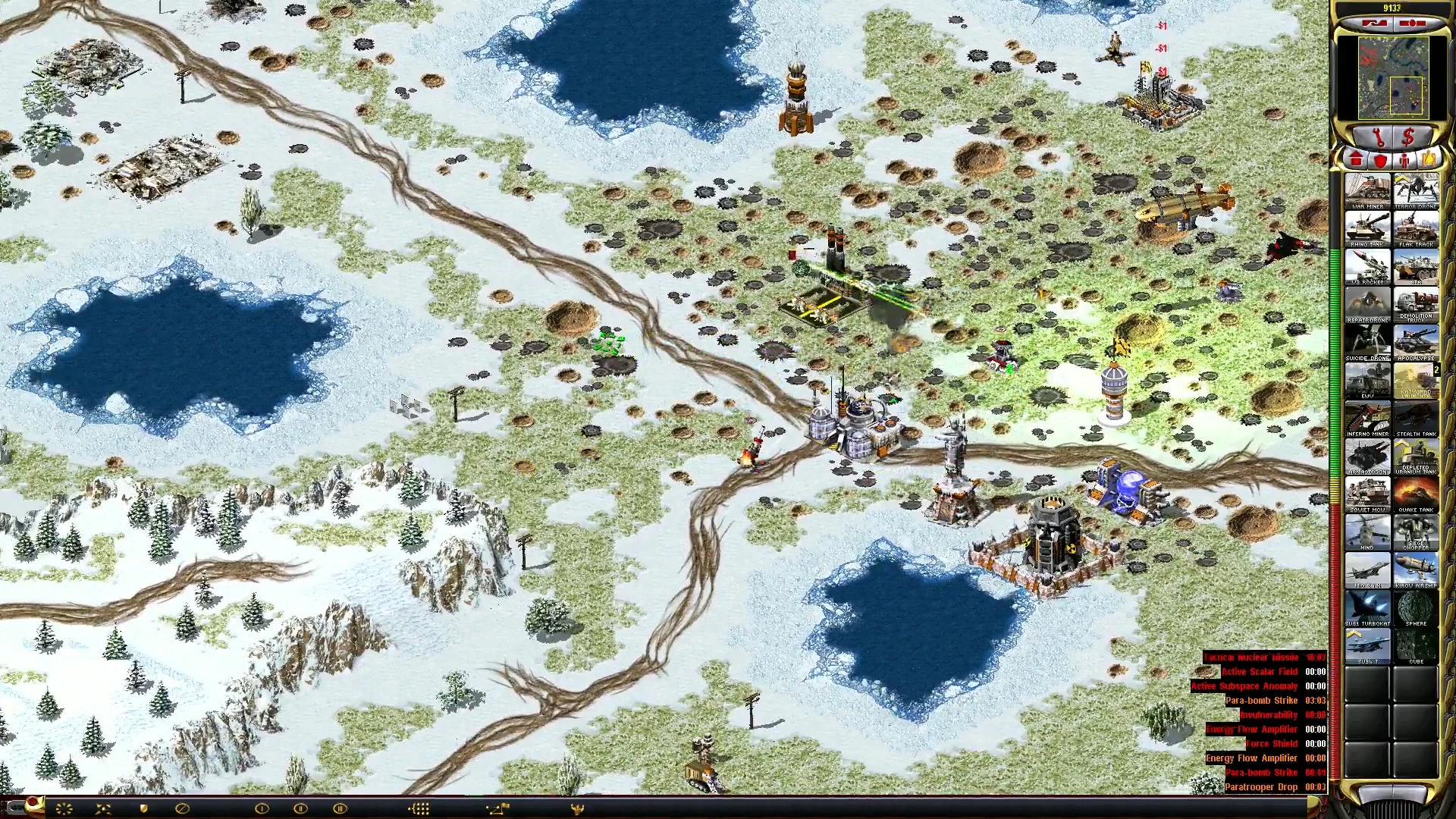 Screenshot of a snowy battlefield landscape with military buildings, units, and user interface of Red Alert 2 Apocalypse mod