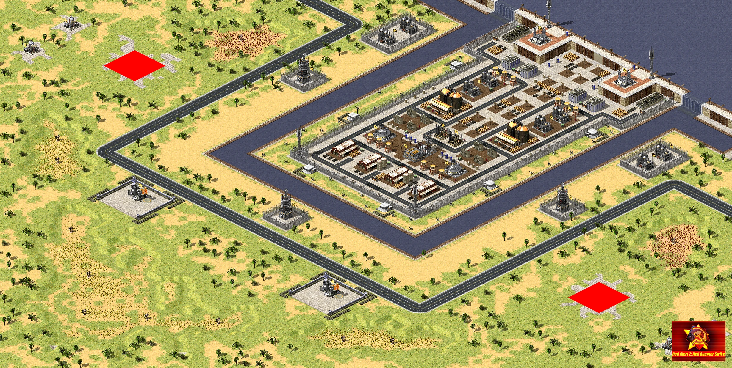Isometrische Ansicht einer befestigten Basis mit Straßen, Verteidigungstürmen und Wassergraben im Red Counter-Strike Mod für Command & Conquer Yuri's Revenge