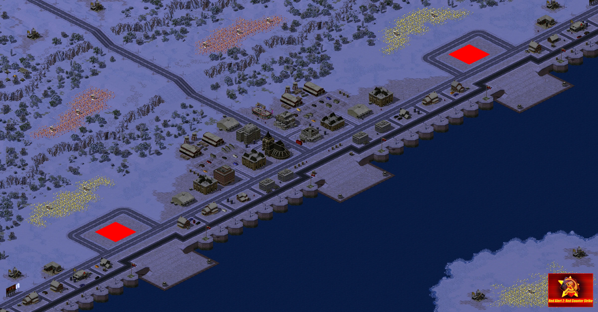 Isometrische Ansicht einer verschneiten Stadt mit Industriegebäuden, Straßen und Docks am Wasser im Yuri's Revenge Mod