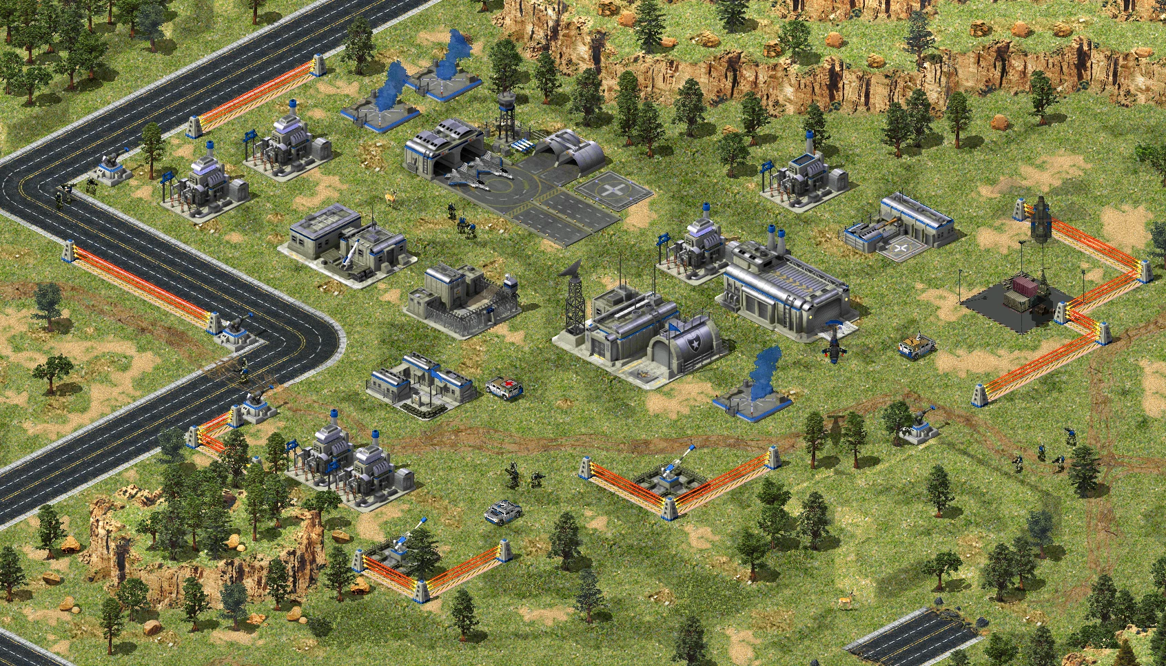 Вид сверху на военную базу с постройками, обороной и юнитами в моде Retro Generals для Command & Conquer Yuri's Revenge