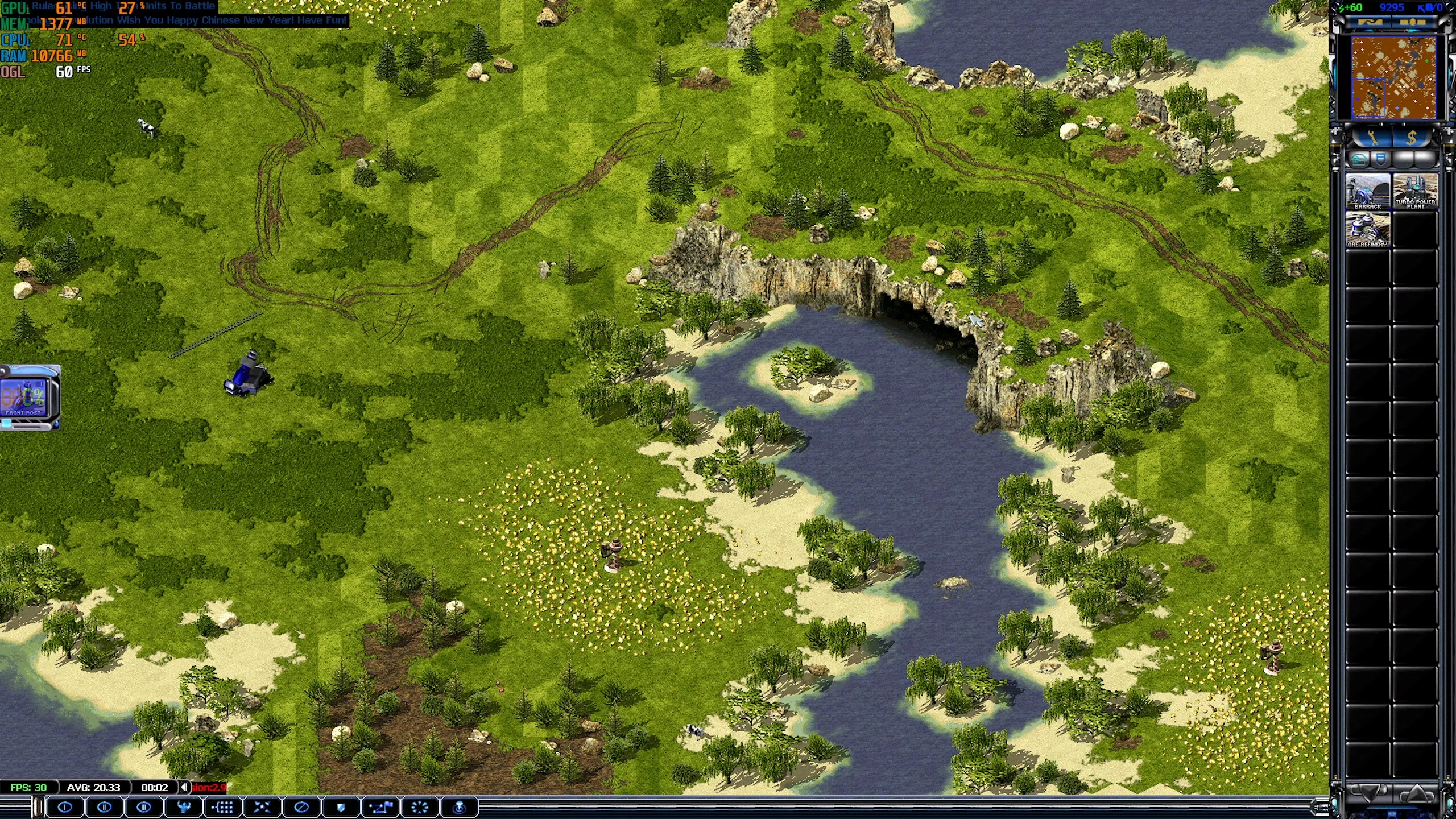 Zrzut ekranu mapy gry Command & Conquer Yuri's Revenge z terenem, wodą, jednostkami i interfejsem budowy
