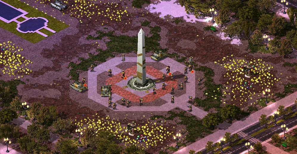 Vista desde arriba de un campo de batalla con soldados y tanques alrededor de un alto monumento obelisco rodeado de árboles y flora luminosa