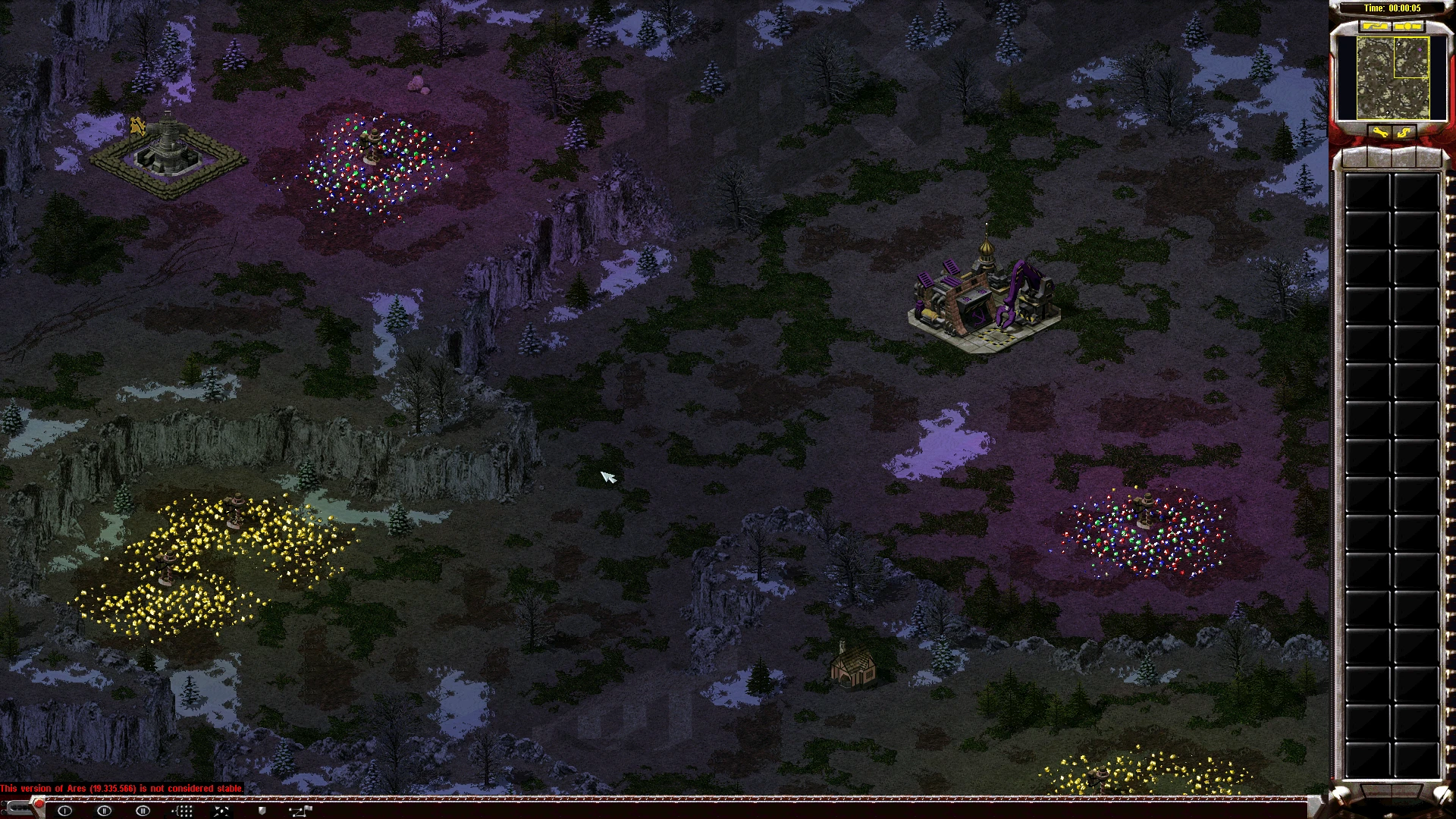 Captura de pantalla del juego con terreno nevado, clústeres de recursos amarillos y multicolores y base de color púrpura