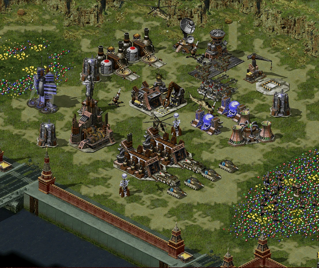 Draufsicht auf eine detaillierte Militärbasis mit Gebäuden, Panzern und bunten Dekorationen aus dem The Moment of Genesis Mod