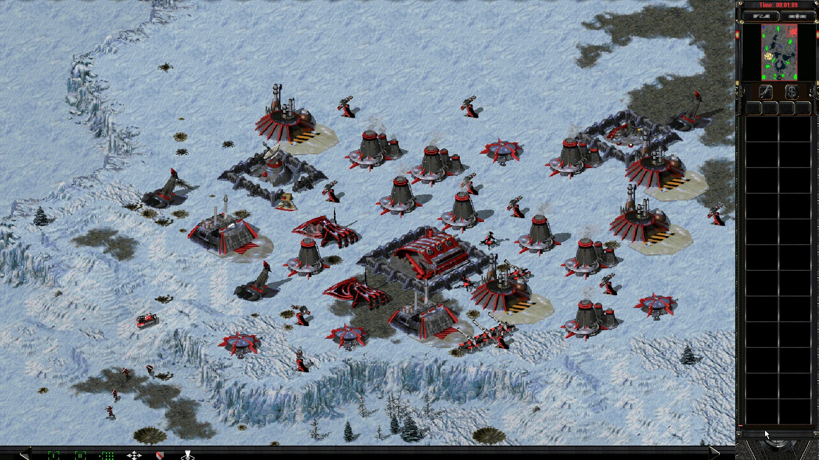 Скриншот игры с заснеженной базой Kane's Root Canal с постройками и юнитами в моде Yuri's Revenge