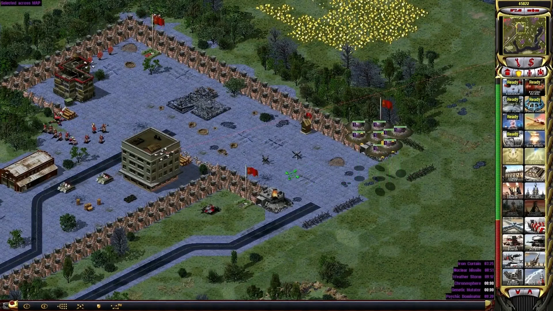 Gameplay screenshot showing base with walls, defensive structures, and flying units in Yuri Resurgence Campaign mod